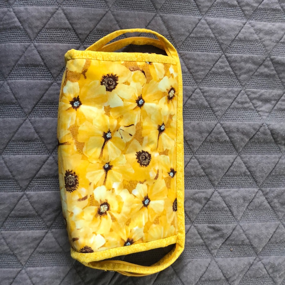 Yellow floral fabric toiletry / makeup bag